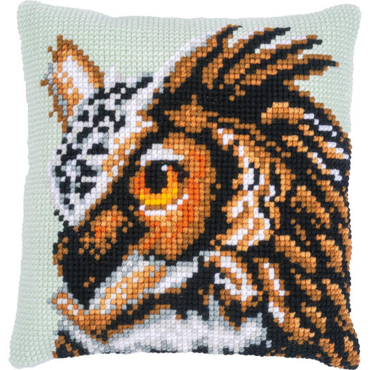 Square cushion stitched with an owl