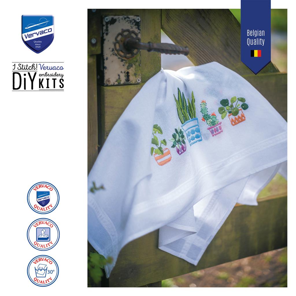 Embroidered tablecloth with house plants design