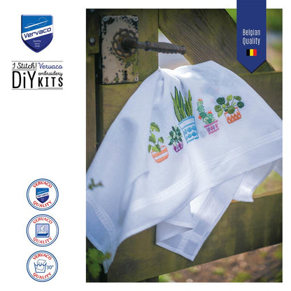 Embroidered tablecloth with house plants design
