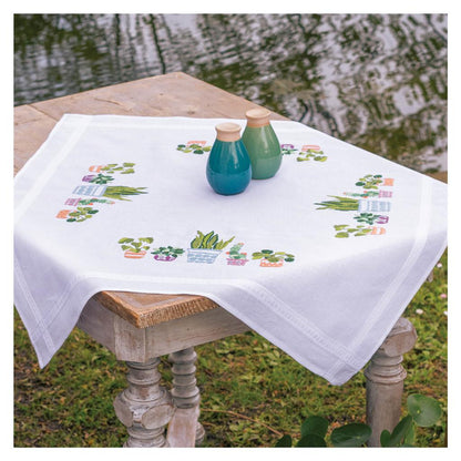 Embroidered tablecloth with house plants design