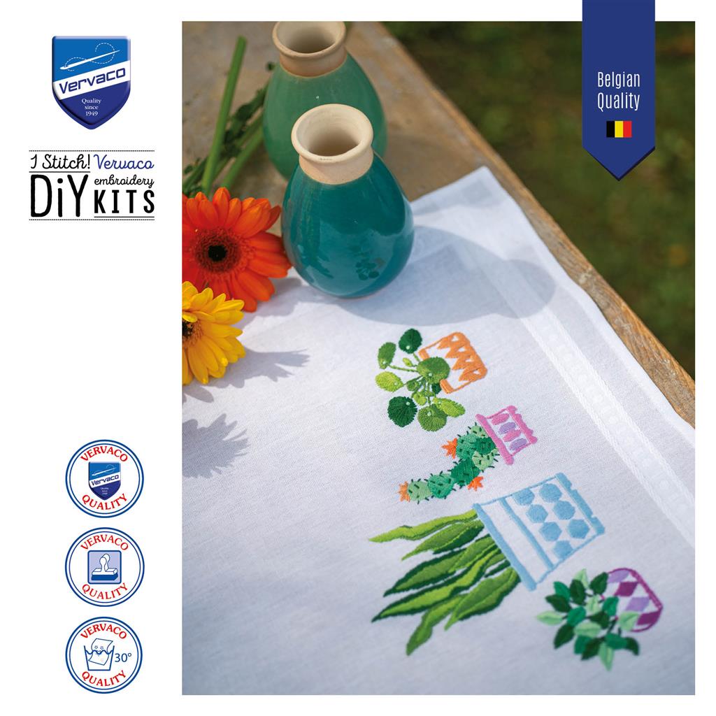 Embroidered table runner with house plants design