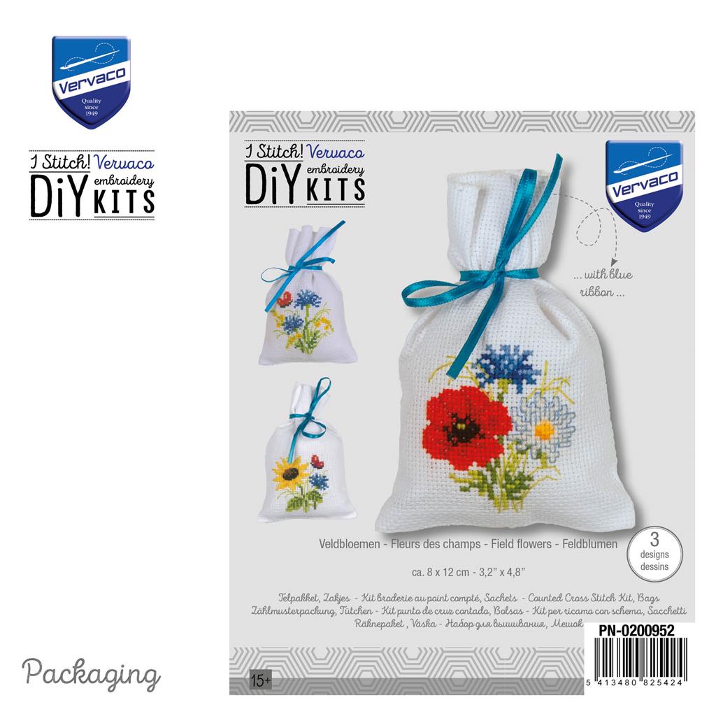 Three small cross stitch bags with field flowers designs