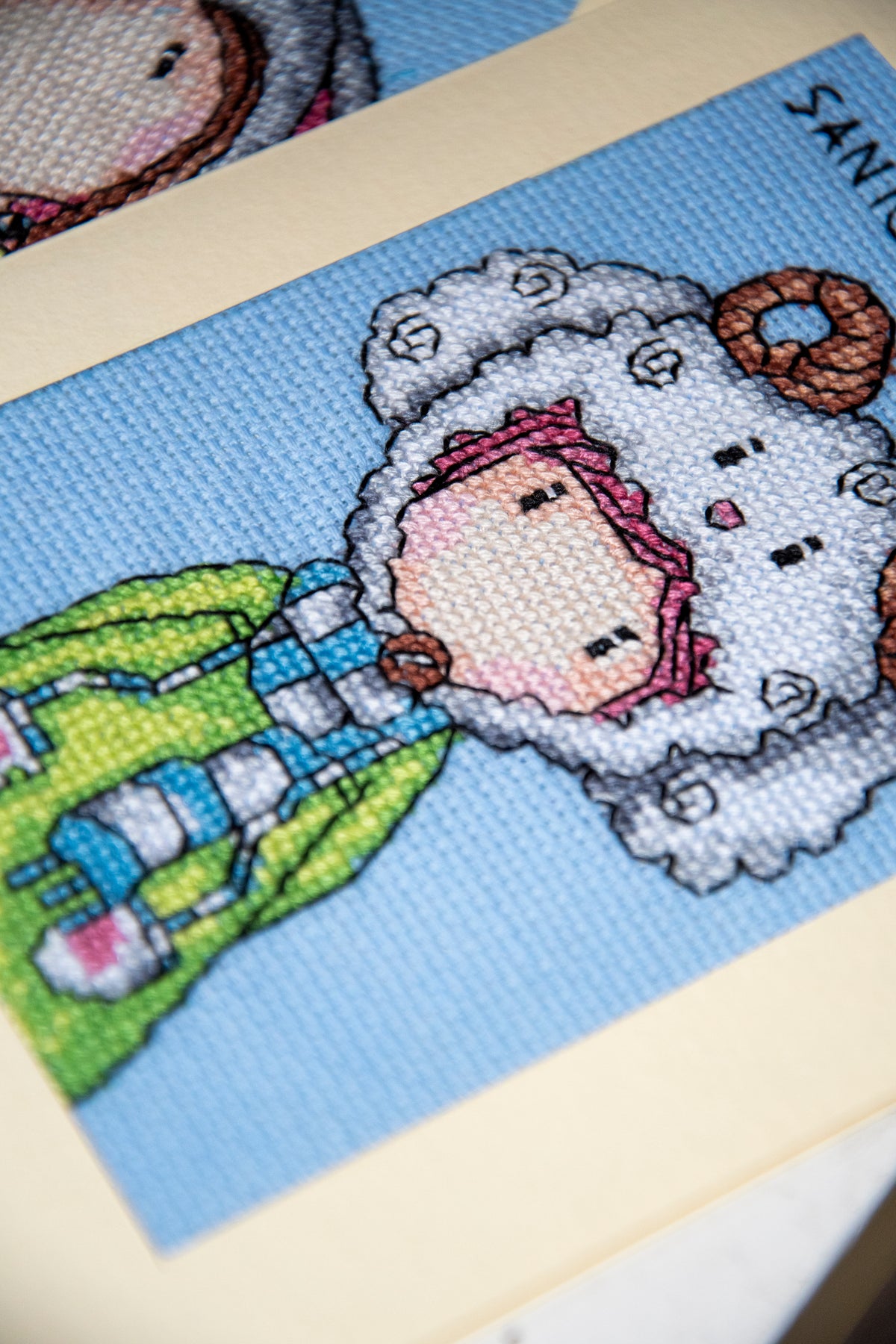 Three Gorjuss cross stitch greetings cards from the Vervaco kit