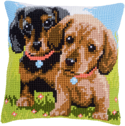 Cross stitched cushion with dachshund dogs