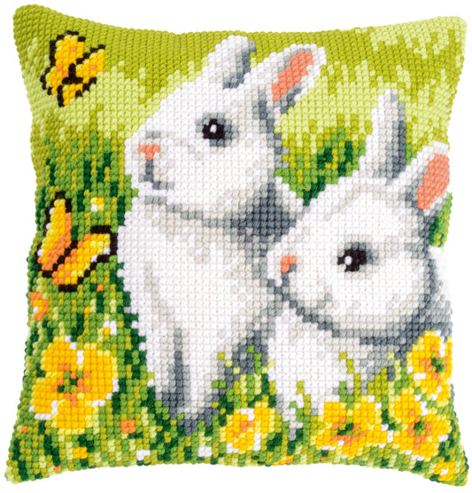 Cross stitch cushion with rabbits and butterflies design