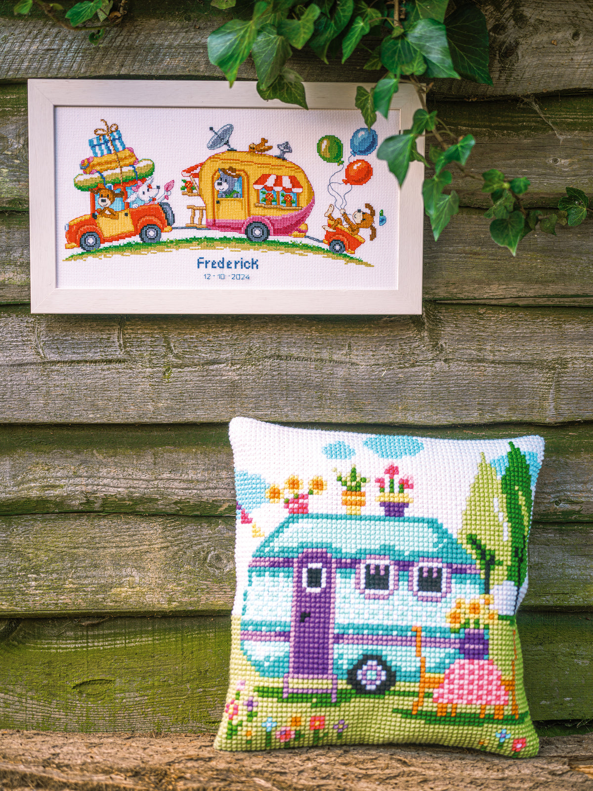 Cross stitch cushion with a road trip holiday design
