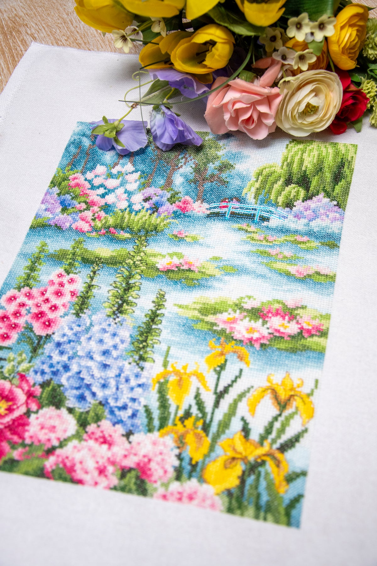 Cross stitch of a water lily pond scene