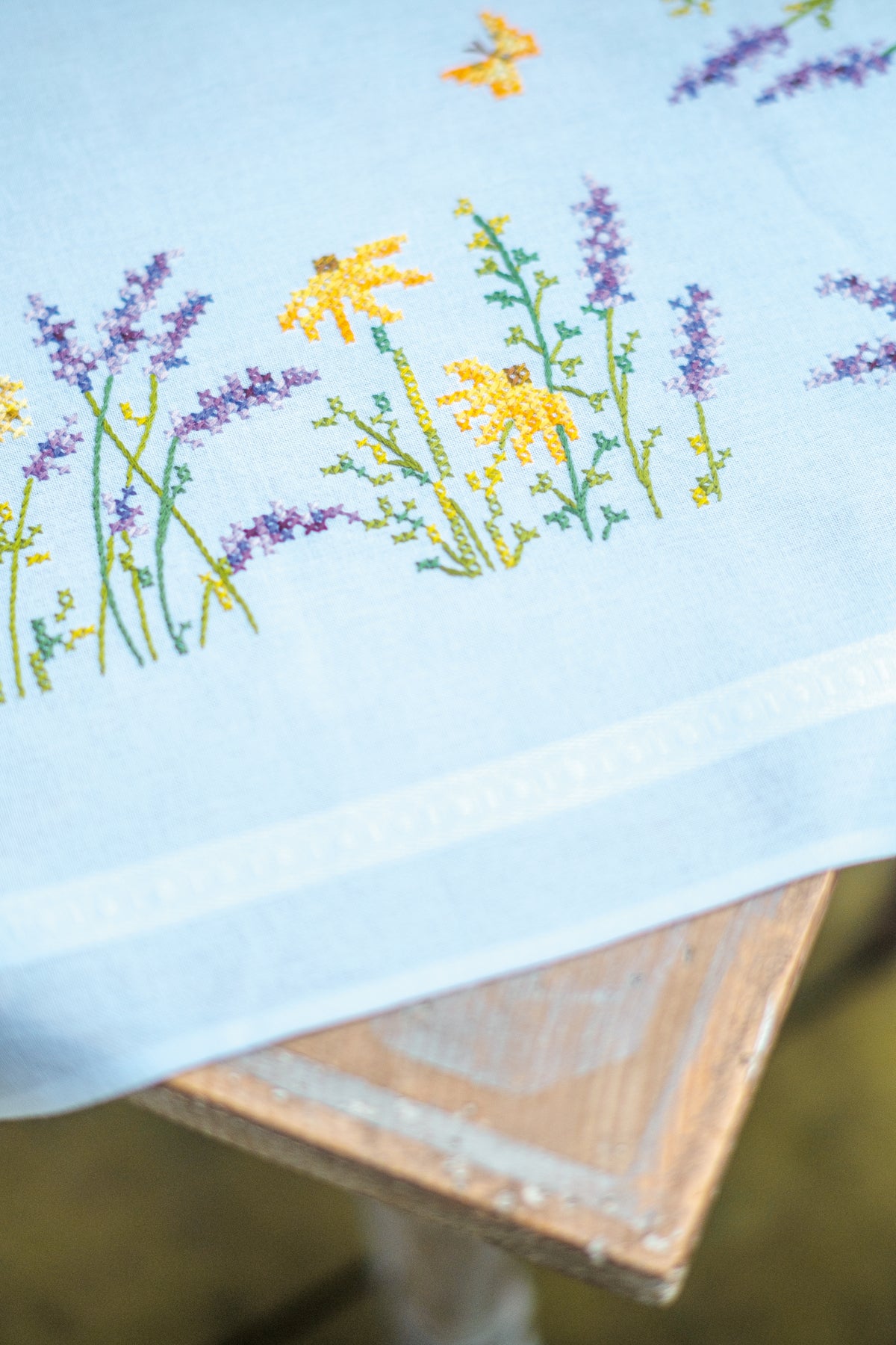 Embroidered tablecloth with lavender sprigs