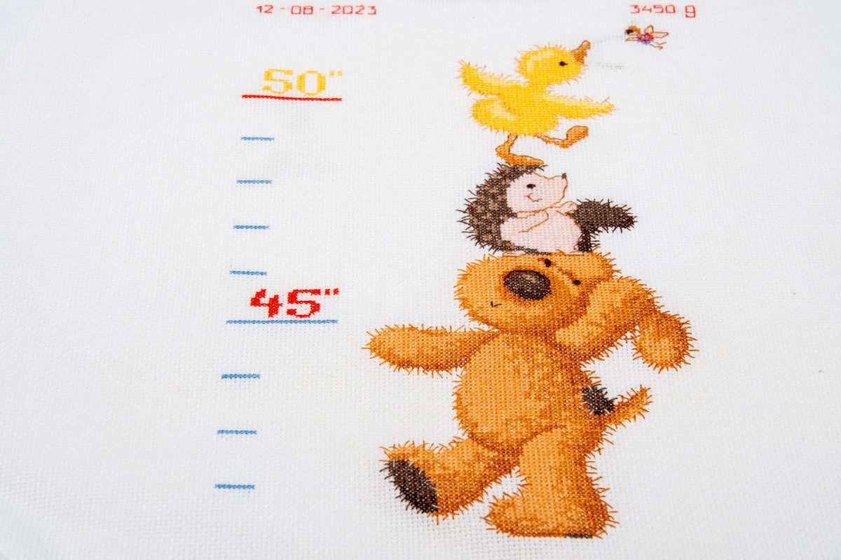 Cross stitch height chart with Popcorn the bear and friends