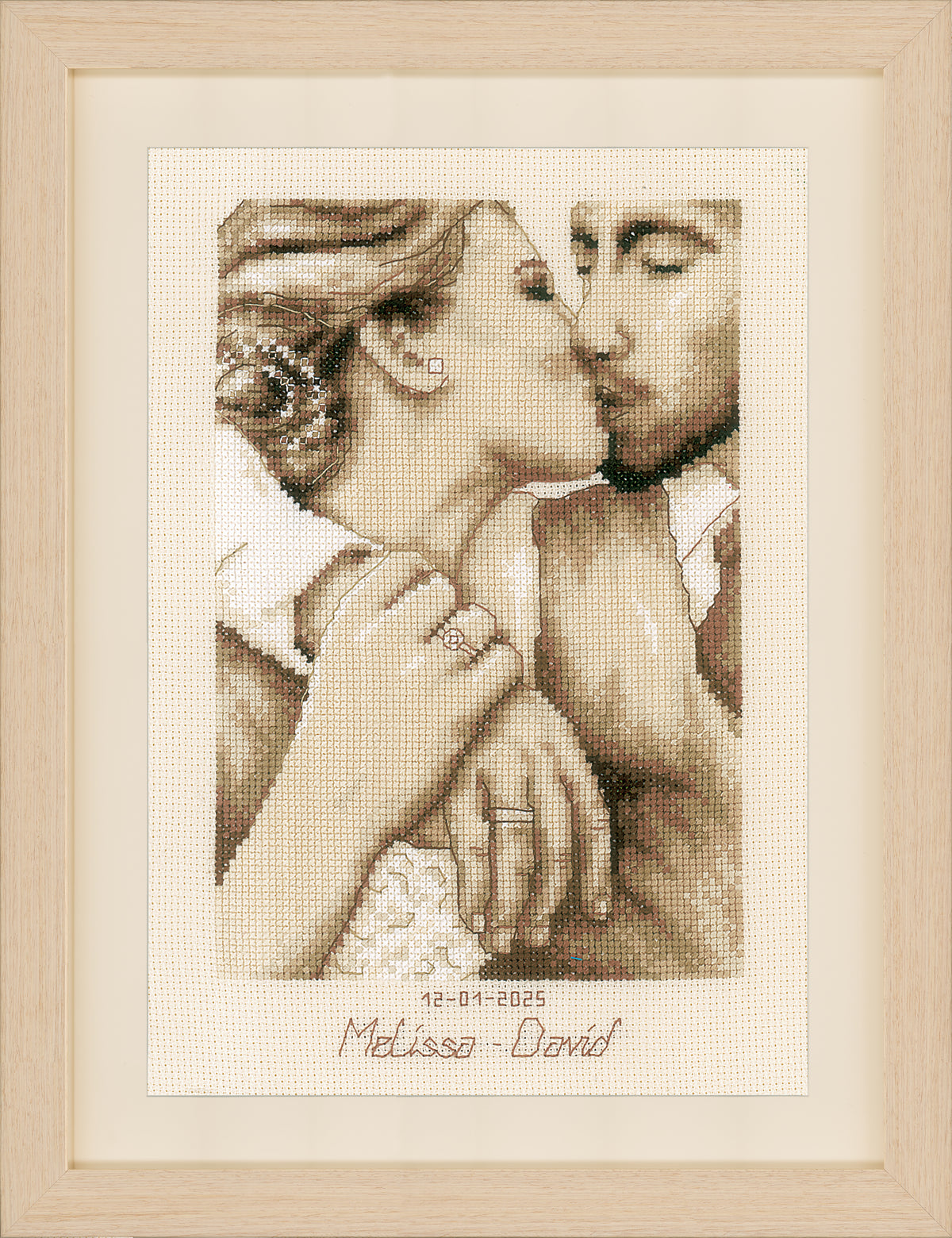 Cross stitch of a loving kiss
