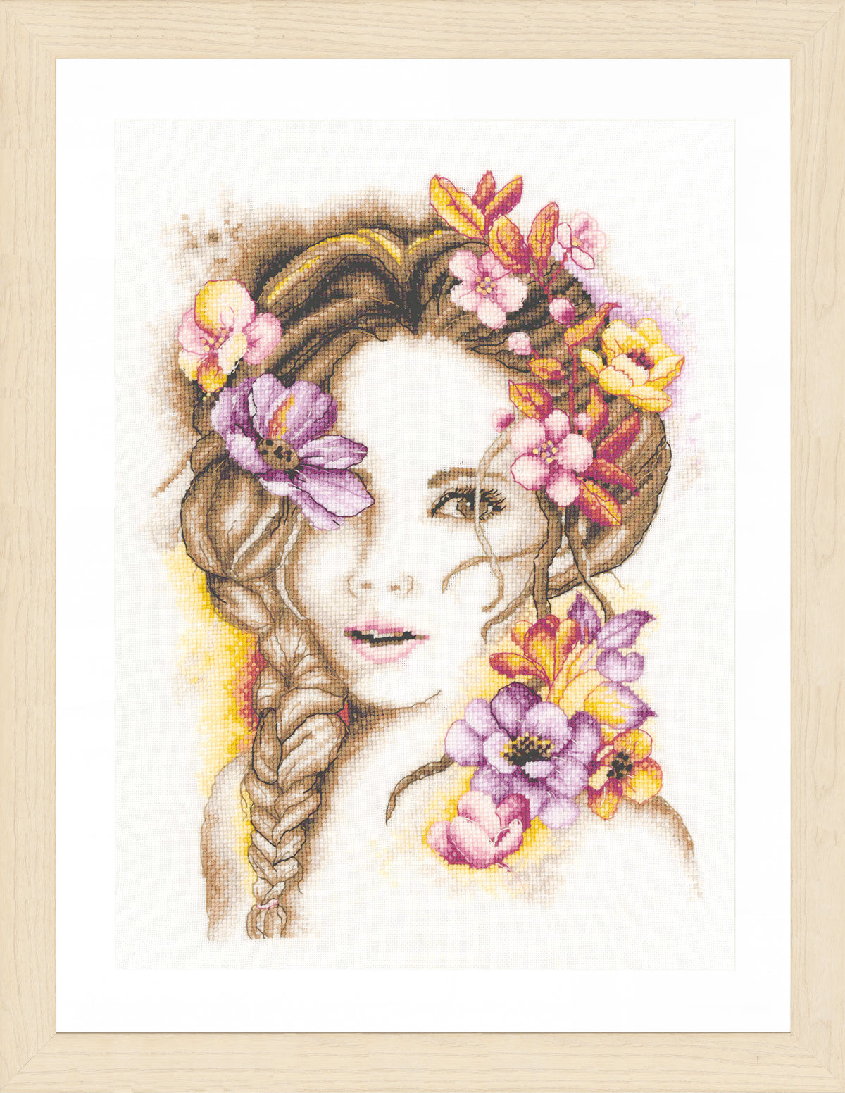 Cross stitch of a lady with flowers