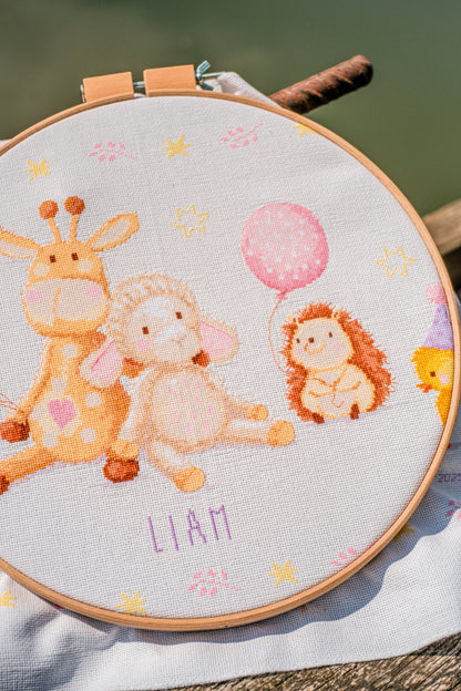 Cross stitched birth record with party animals