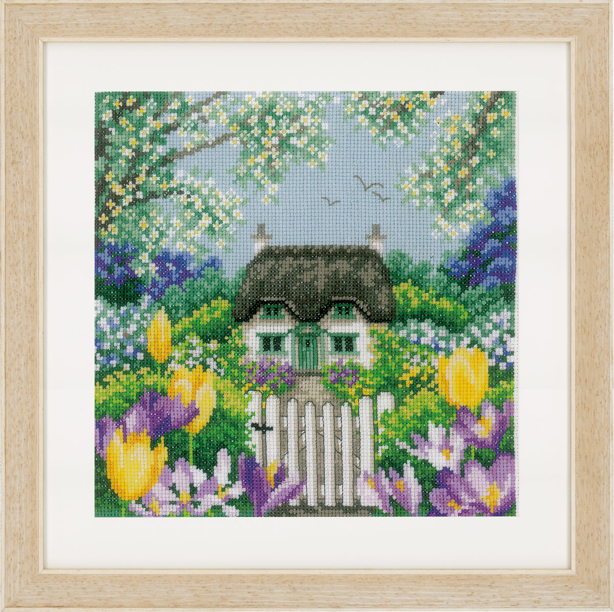 Square cross stitch of a spring scene