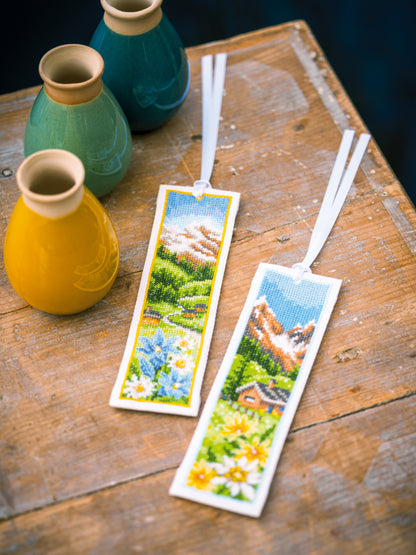 Two cross stitch bookmarks with alpine flowers