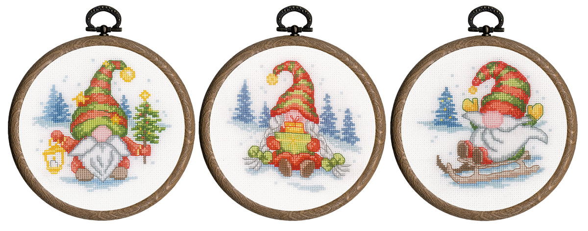 Three miniature cross stitch gnomes