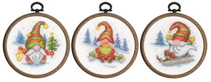 Three miniature cross stitch gnomes