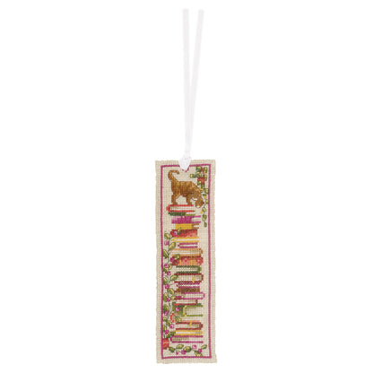 Two cross stitched bookmarks with cats sitting on stacks of books