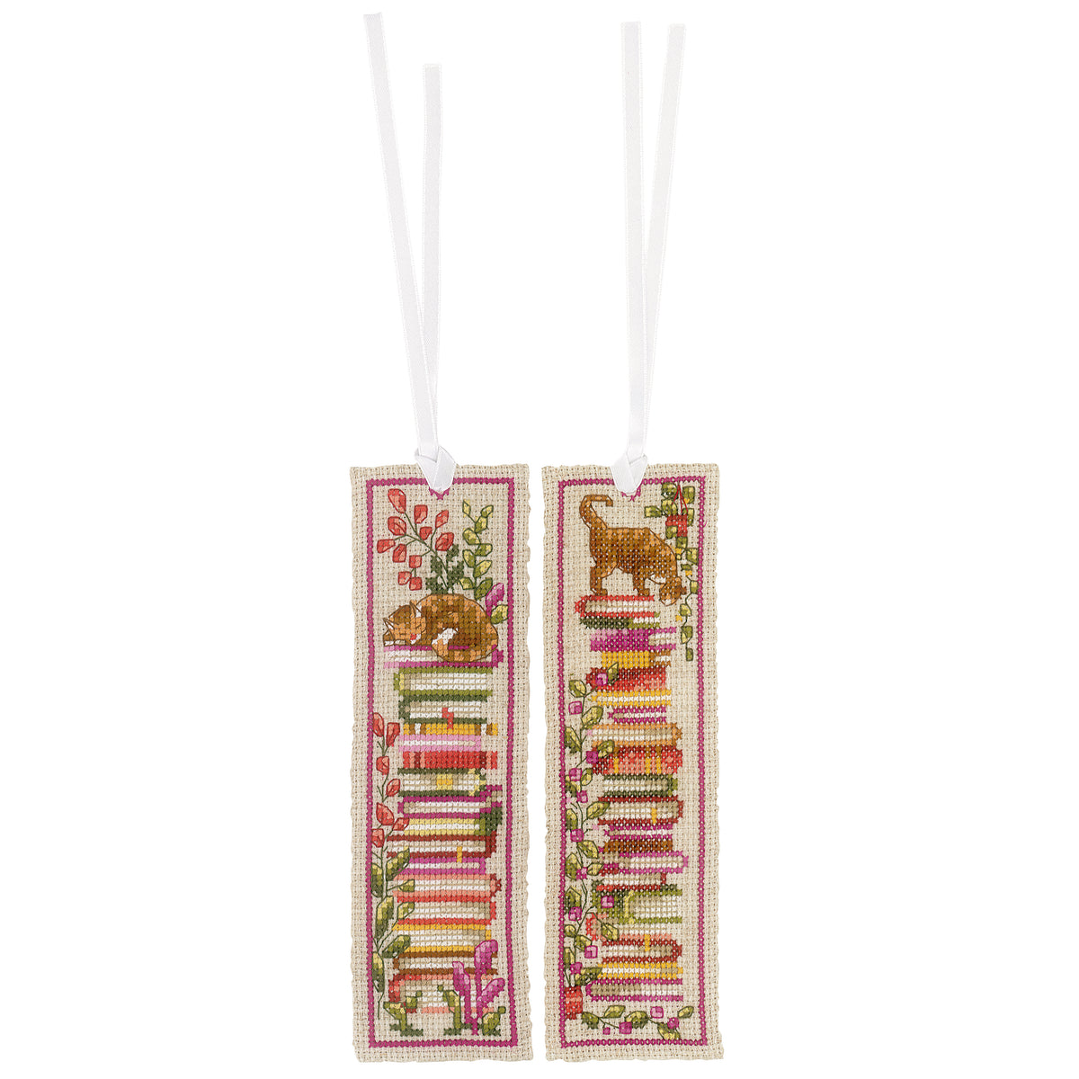 Two cross stitched bookmarks with cats sitting on stacks of books