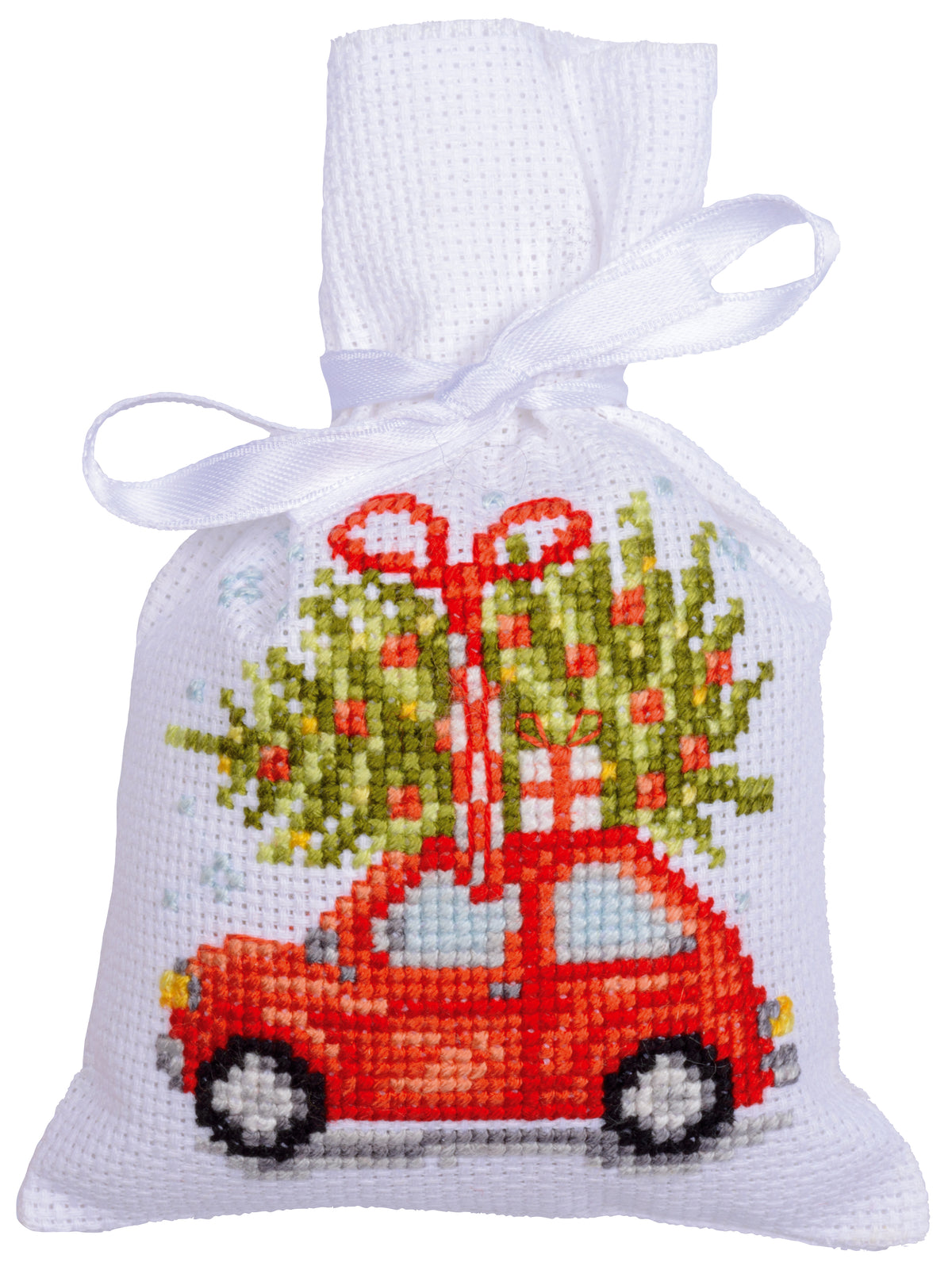 Three cross stitched Christmas gift bags tied with ribbon