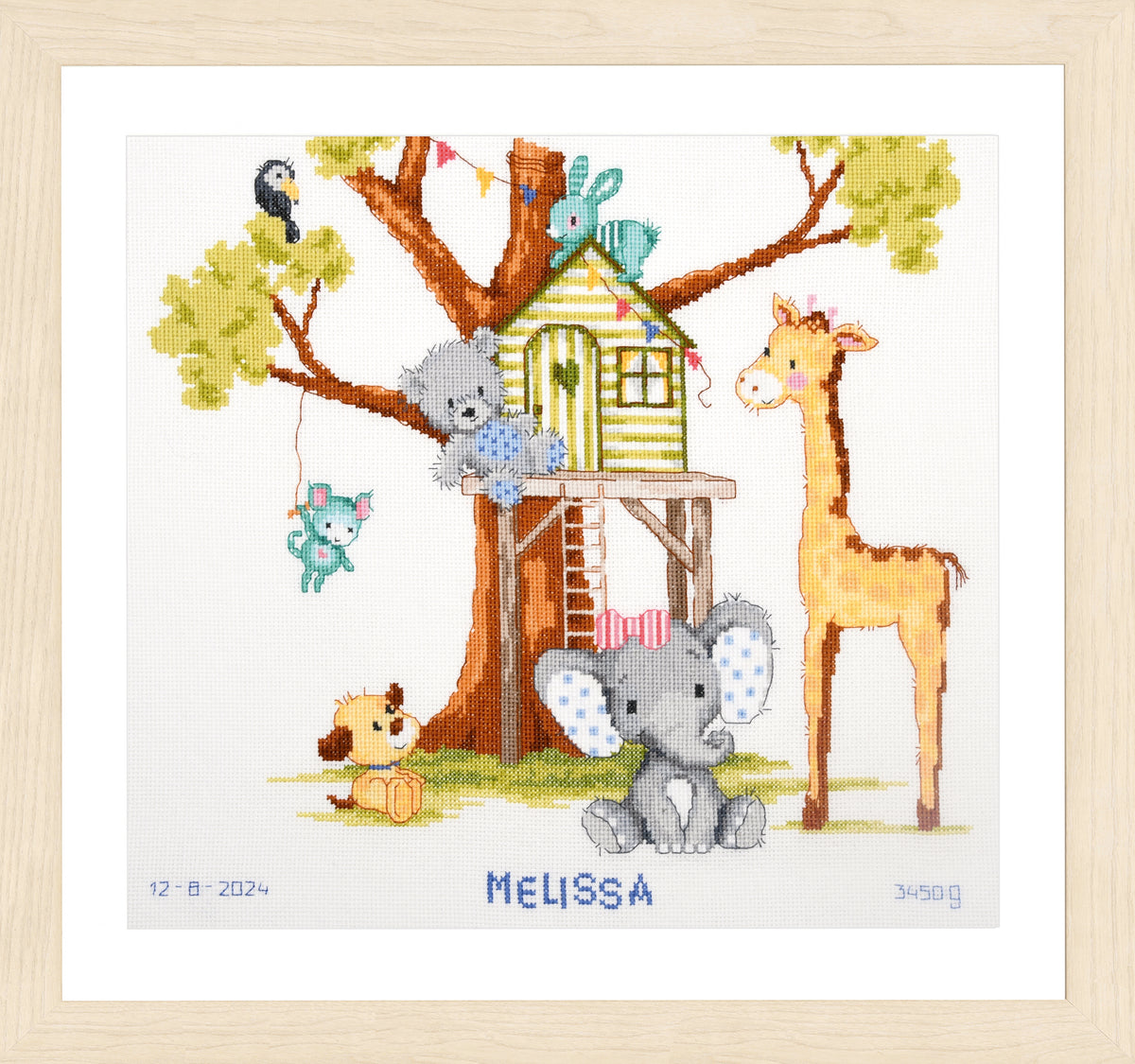 Vervaco At the Tree House Birth Record counted cross stitch kit showing the finished design