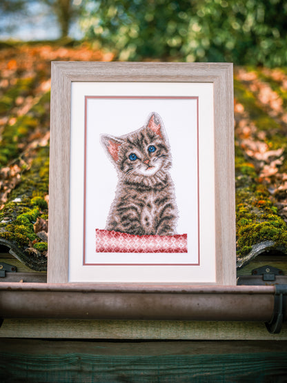 Cross stitch picture of a cat