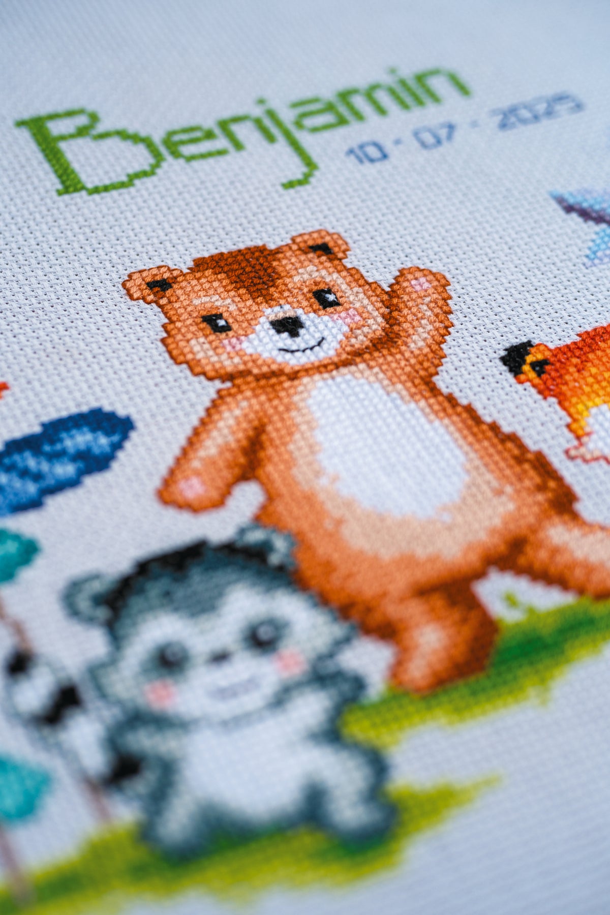 Vervaco Animals Birth Record counted cross stitch kit showing the finished design