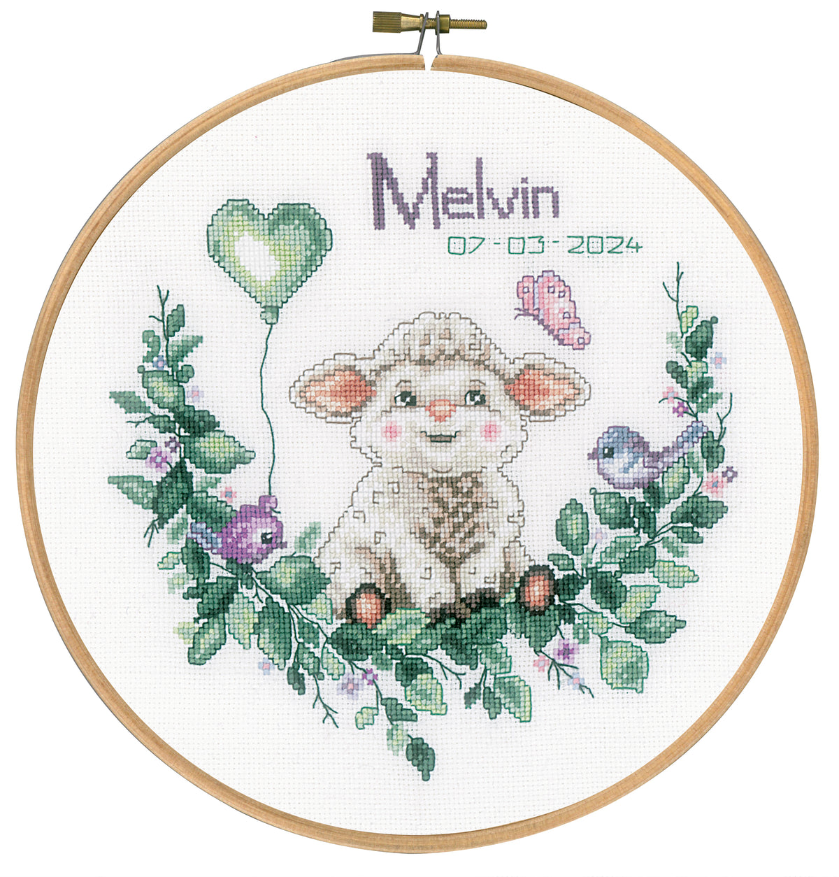Cross stitch picture of a sheep