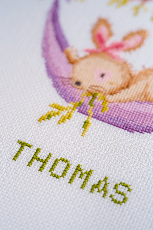 Vervaco Bunnies in the Garden counted cross stitch kit showing the finished design