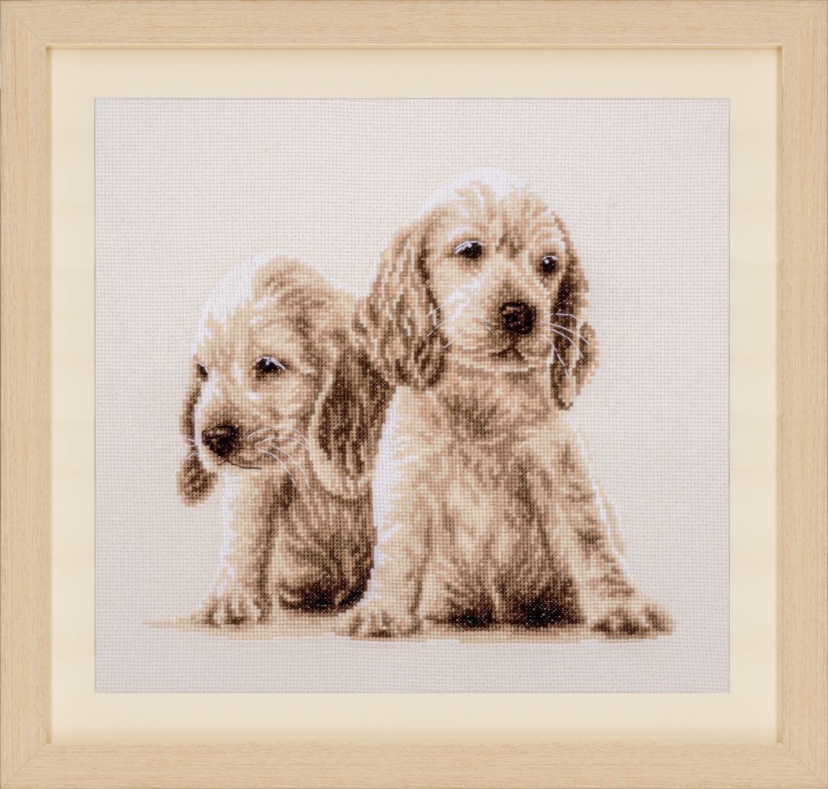 Vervaco Two Puppies counted cross stitch kit showing the finished design