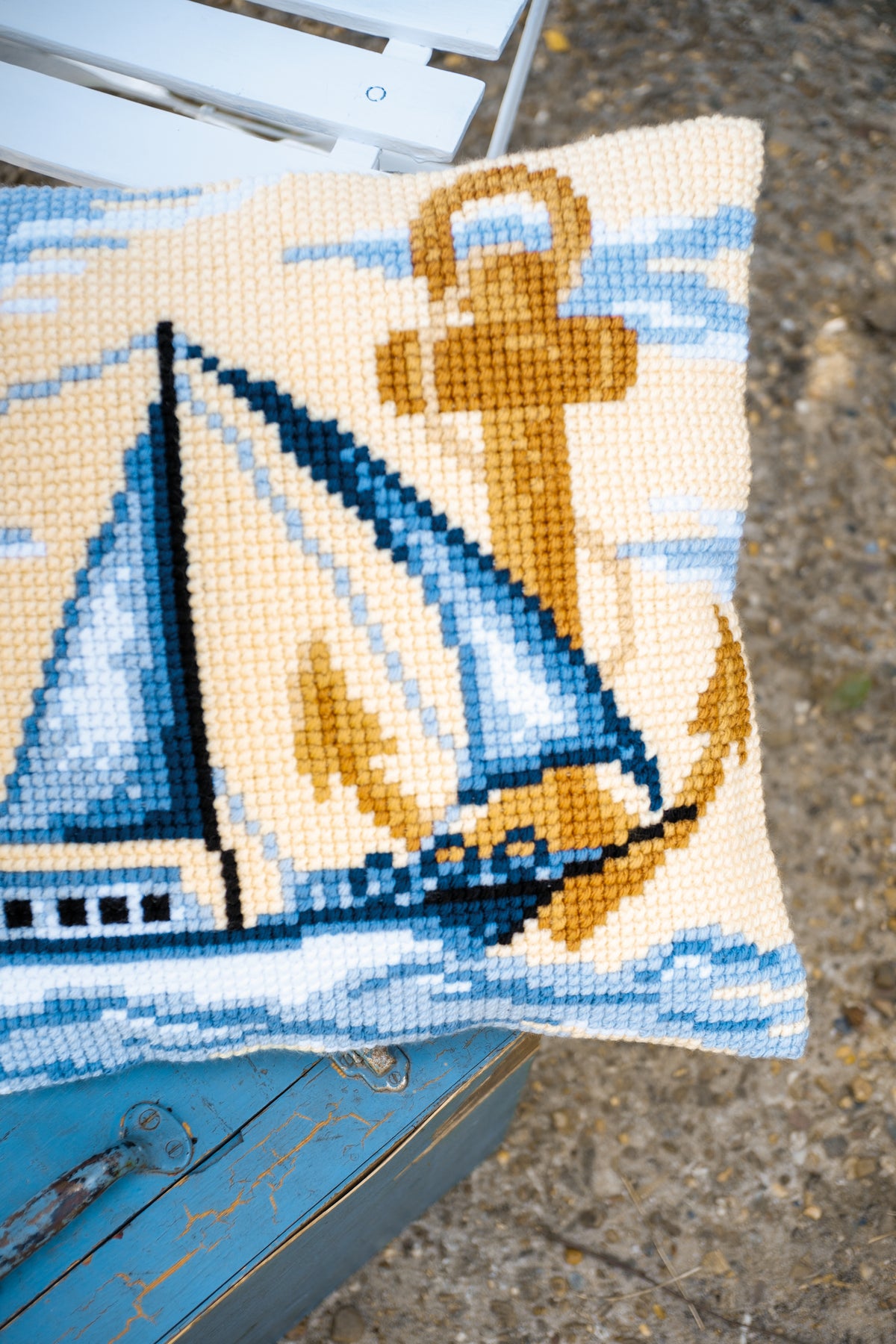 Vervaco Sailboat cross stitch cushion kit showing the finished cushion