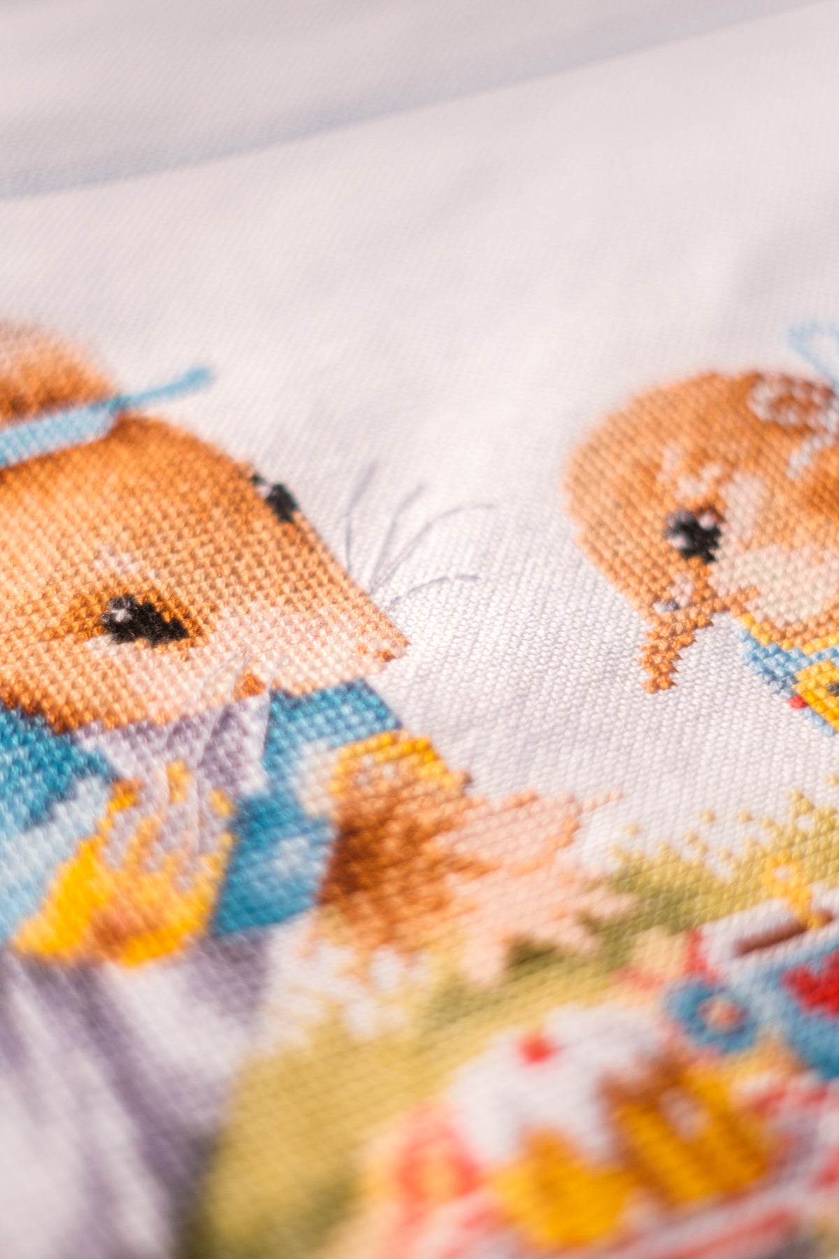 Lanarte Picnic with Vera counted cross stitch kit showing the finished design