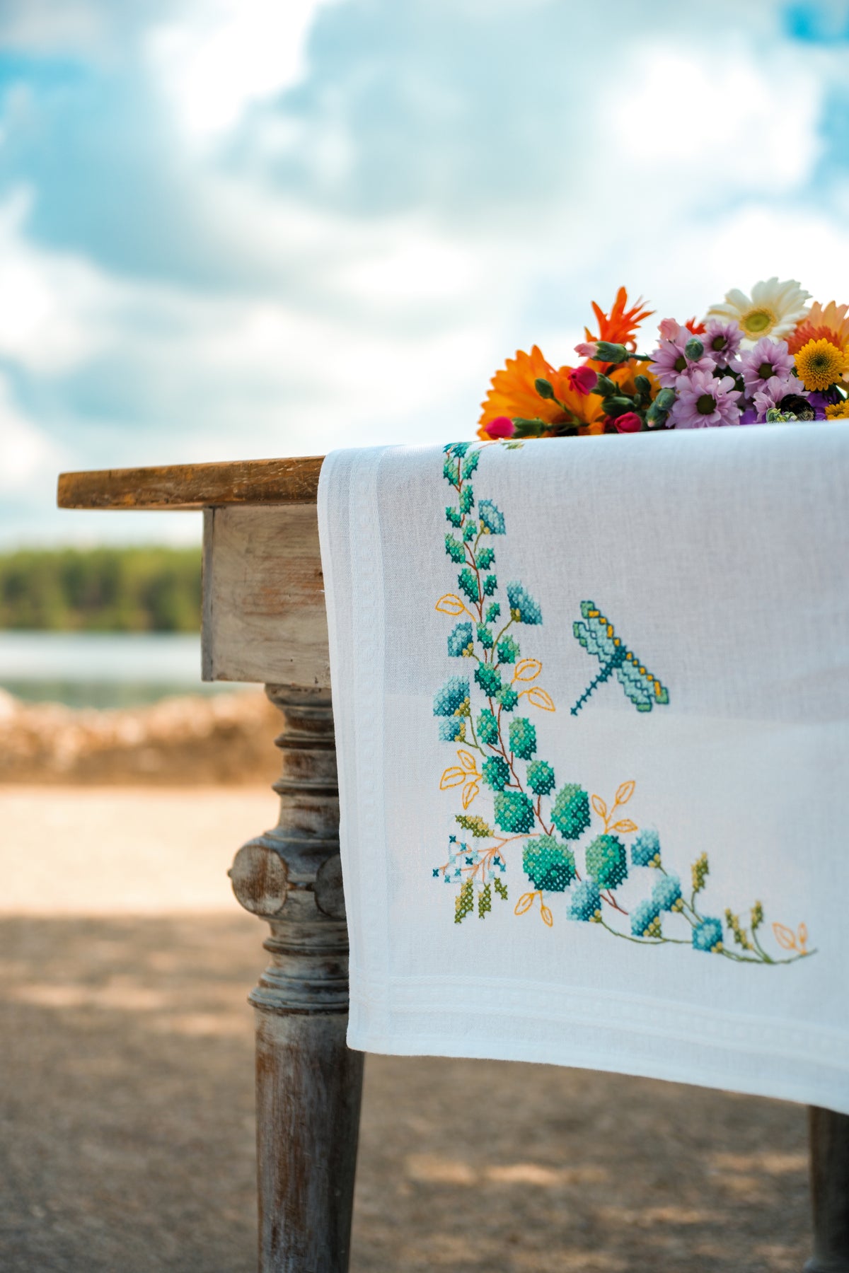 Vervaco Eucalyptus embroidered table runner kit showing the finished piece