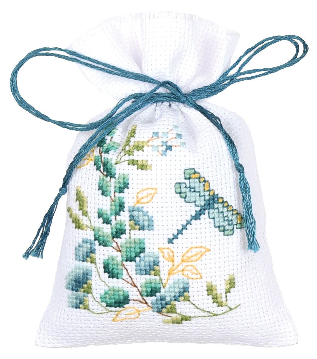 Three small white gift bags cross stitched with nature motifs