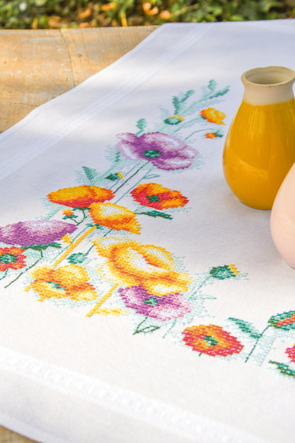 Square white tablecloth embroidered with red poppies