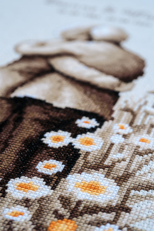 Cross stitch picture with an eternal love design