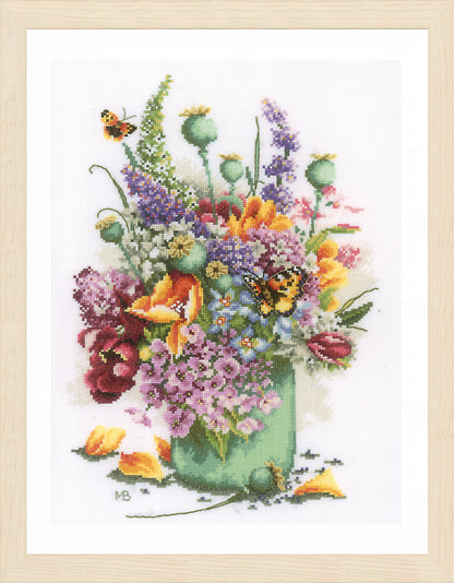 Cross stitch picture of a colourful flower bouquet