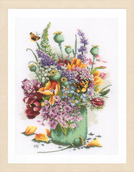Cross stitch picture of a colourful flower bouquet