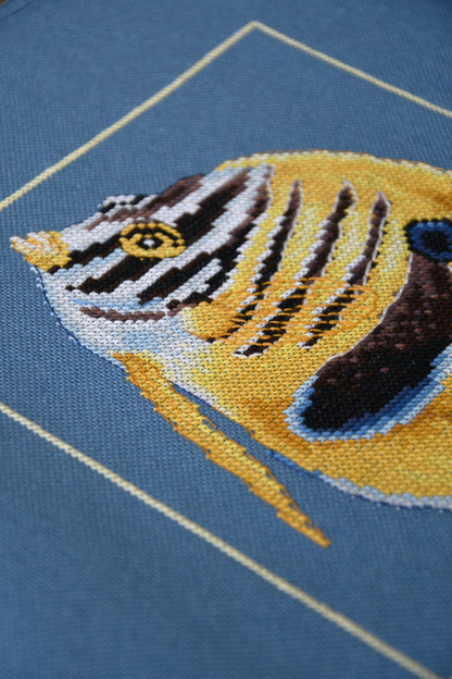 Cross stitch design of a yellow zebra fish