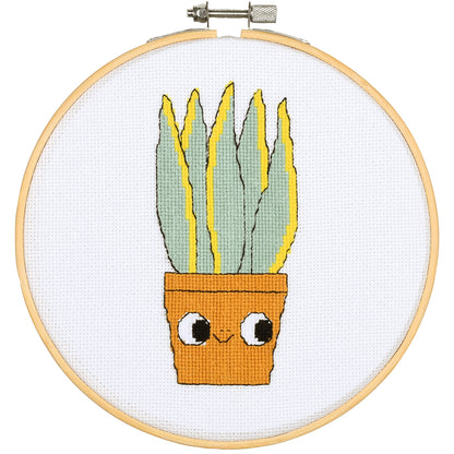 Eva Mouton sansevieria cross stitch design in an embroidery hoop