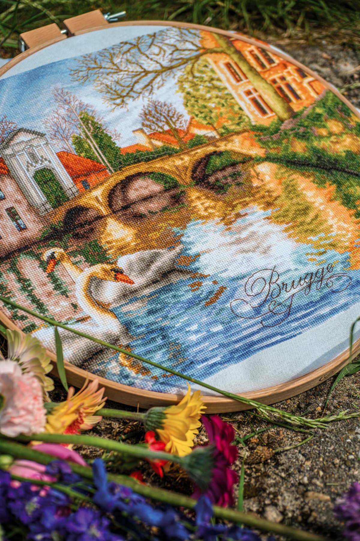 Cross stitch picture of swans on a canal in Bruges