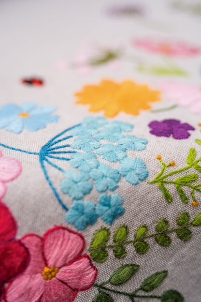 Embroidered tablecloth with cheerful spring floral design