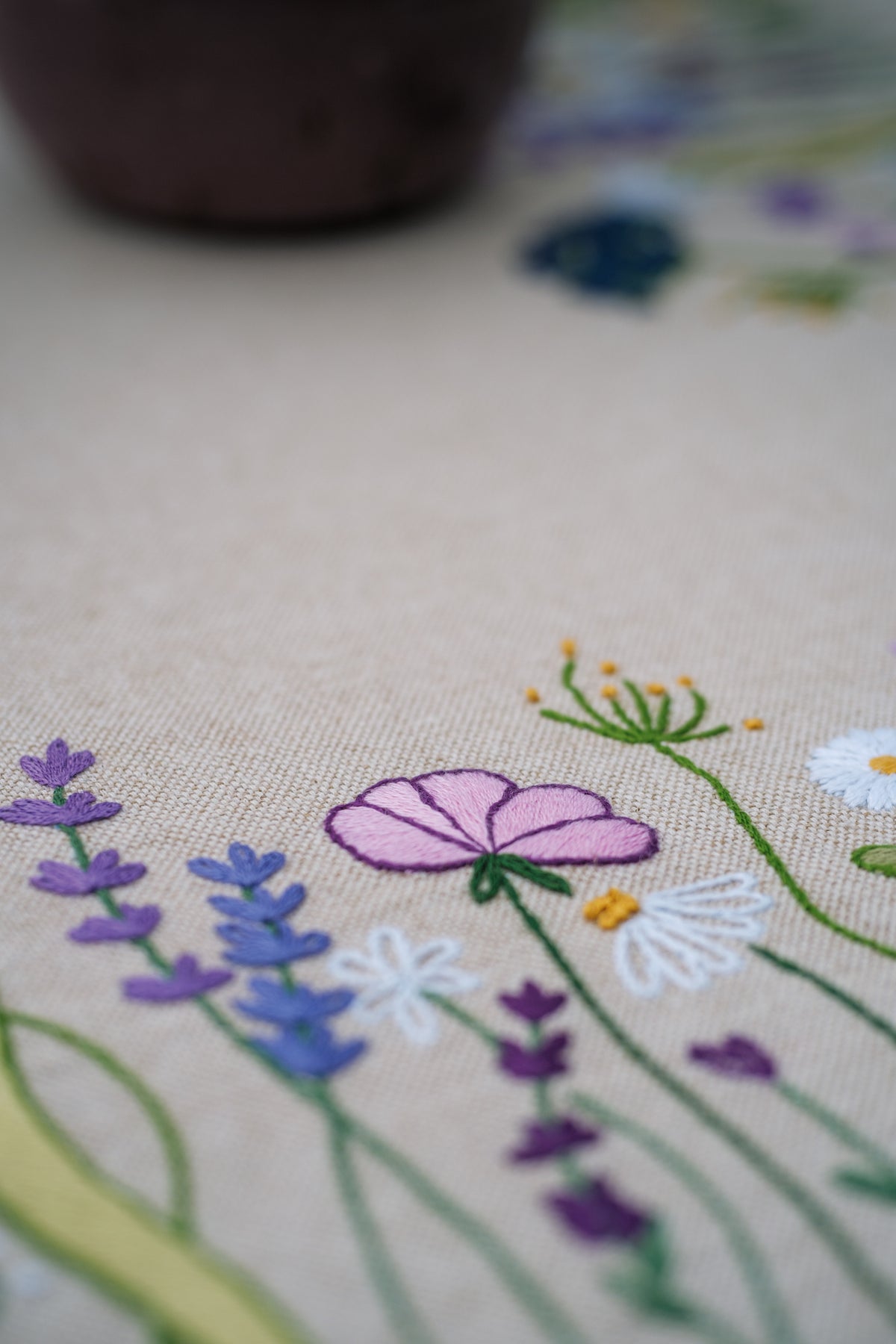 Embroidered tablecloth with purple garden splendour floral design