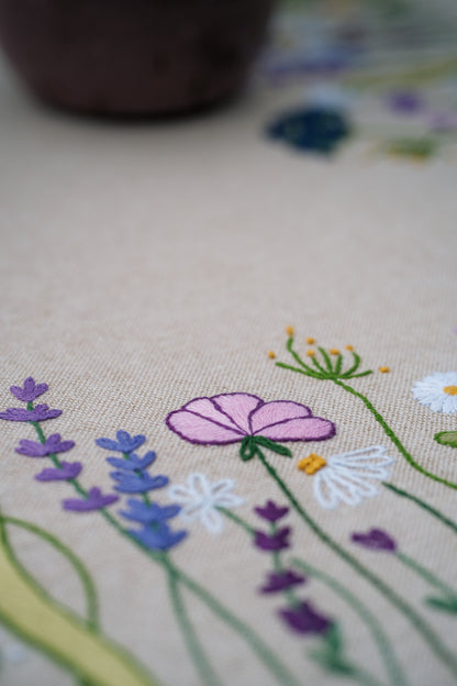 Embroidered tablecloth with purple garden splendour floral design