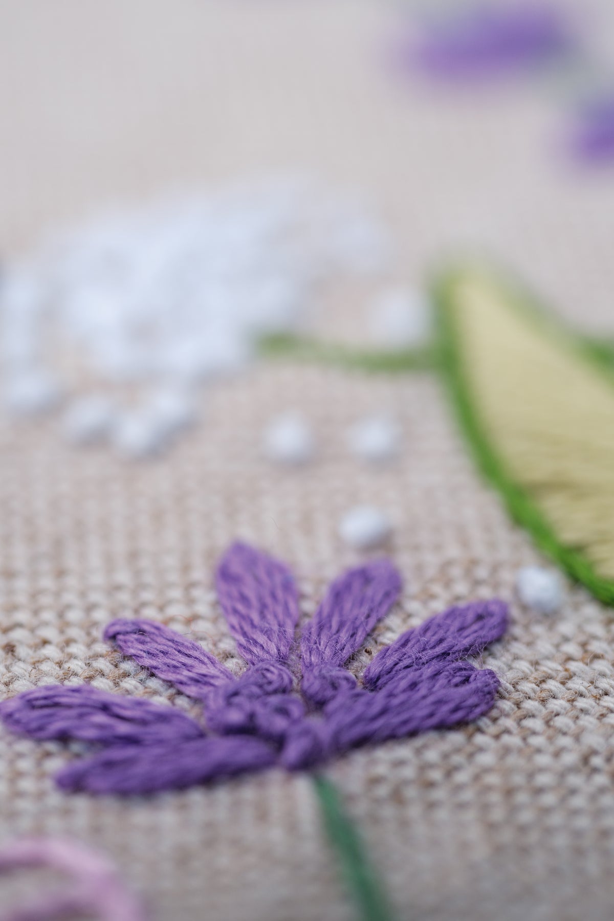 Embroidered tablecloth with purple garden splendour floral design