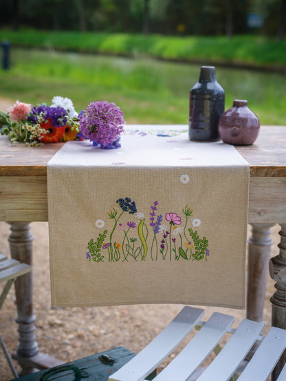 Embroidered table runner with purple garden splendour floral design