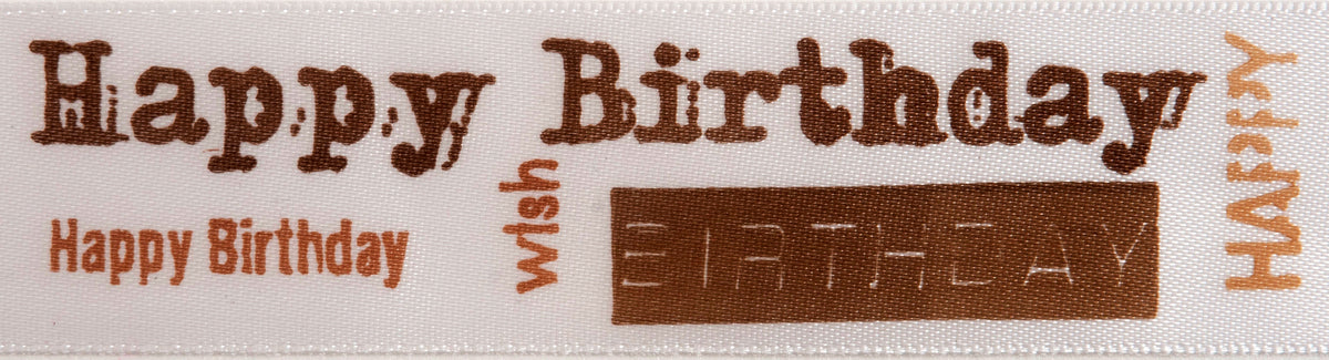 Reel of white satin ribbon printed Happy Birthday in brown