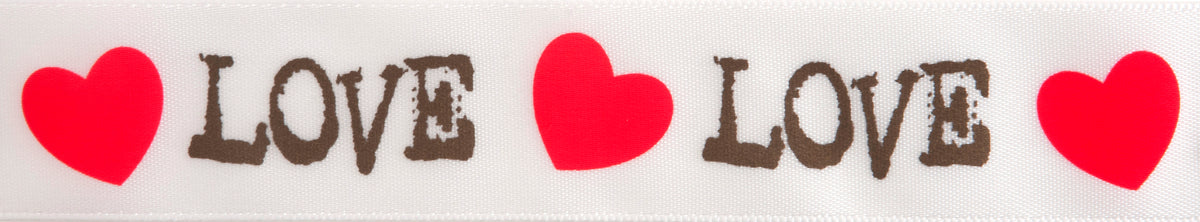 Reel of white ribbon printed with love and hearts in gold and red