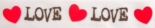 Reel of white ribbon printed with love and hearts in gold and red