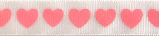 Reel of narrow white satin ribbon printed with baby pink hearts