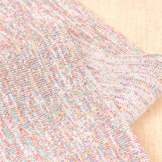 White metallic knit cuff and waistband trim with multicoloured sparkle